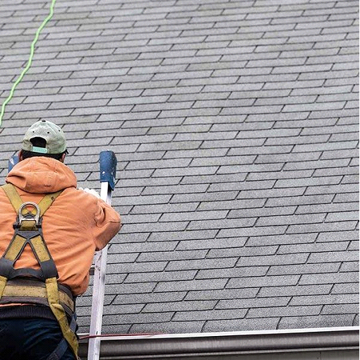 man working on the roof
